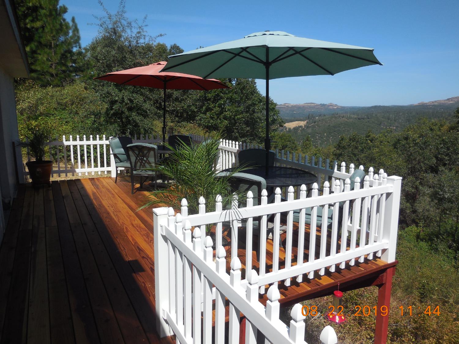 6067 Sheep Ranch Road Murphys, CA 95247 - Photo 6 of 44 a view of balcony with wooden floor outdoor seating and yard