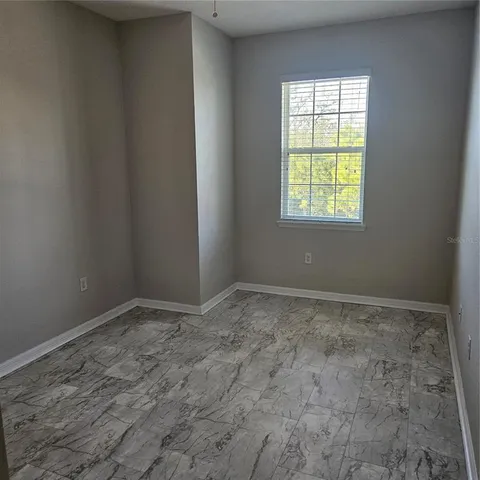 an empty room with a window