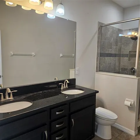 a view of swimming pool from a balcony