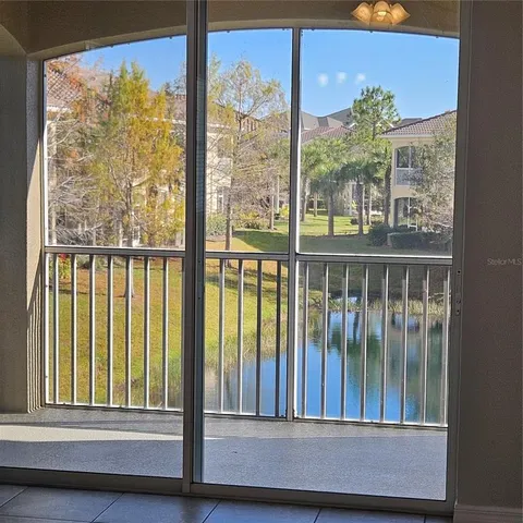 a view of balcony with furniture