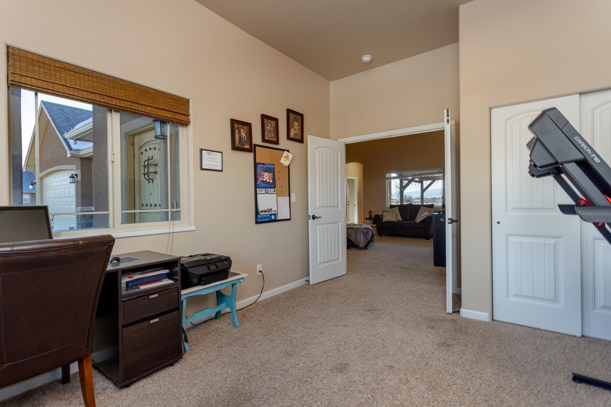 2041 Roma Avenue Fruita, CO 81521 - Photo 5 of 25 a room with furniture and window