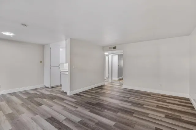 a view of an empty room and window