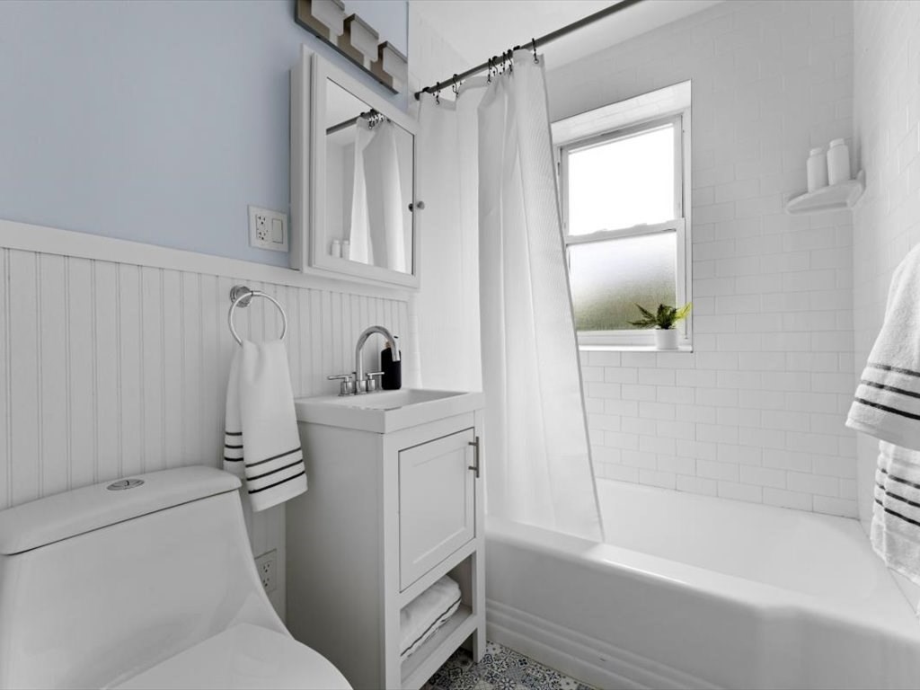 1 Catenaccia Way, Unit 47 Boston, MA 02130 - Photo 17 of 27 a bathroom with a bathtub a sink and a shower