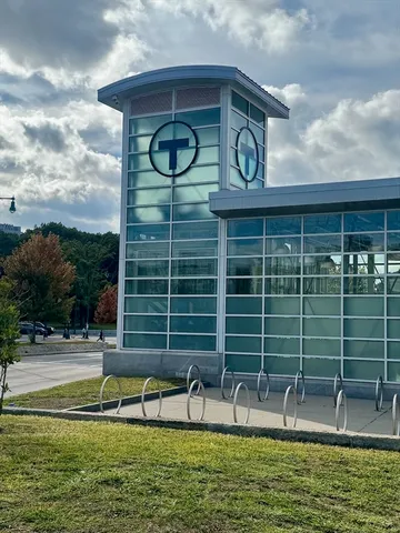 a view of a swimming pool with a lounge chairs