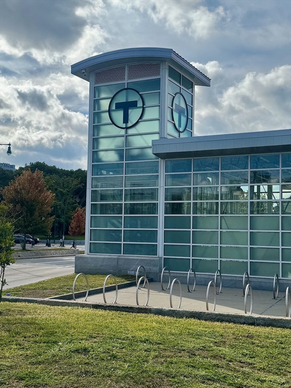 1 Catenaccia Way, Unit 47 Boston, MA 02130 - Photo 24 of 27 a view of a swimming pool with a lounge chairs