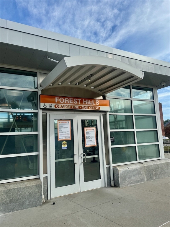 1 Catenaccia Way, Unit 47 Boston, MA 02130 - Photo 25 of 27 a view of an empty room with wooden shelves