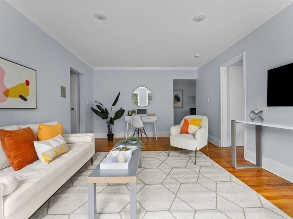 1 Catenaccia Way, Unit 47 Boston, MA 02130 - Photo 4 of 27 a living room with furniture and a flat screen tv