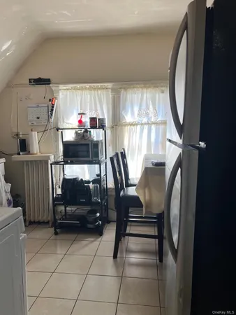 a room with furniture and a window