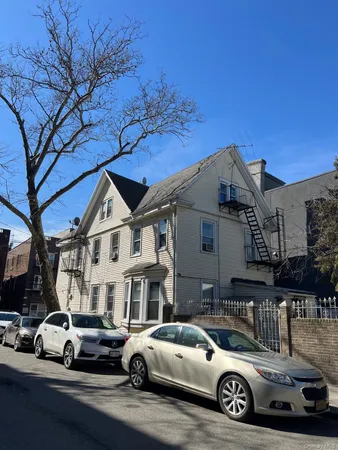 a car parked in front of a house