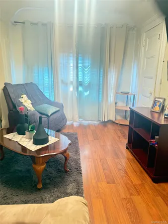 a room with furniture and a window