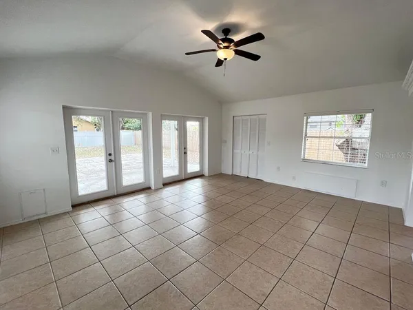 a view of an empty room and window