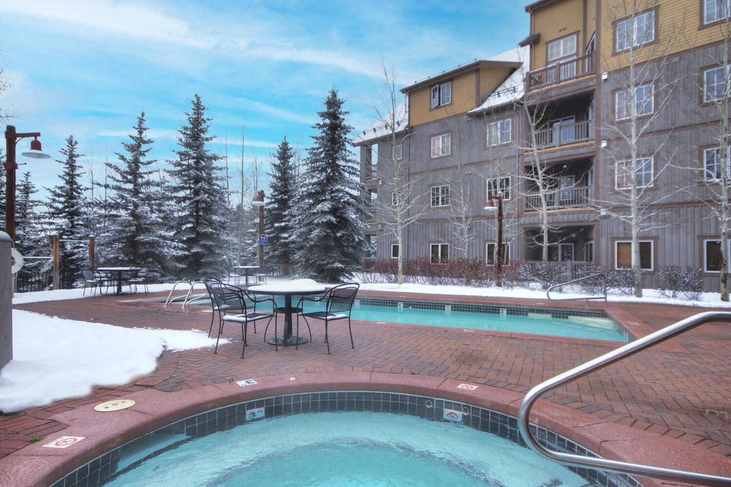 135 Dercum Drive, Unit 8563 Keystone, CO 80435 - Photo 20 of 35 a view of a swimming pool with a patio