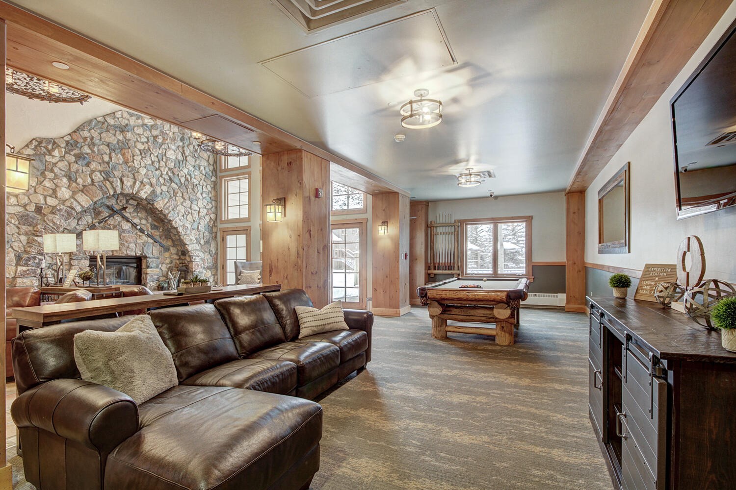 135 Dercum Drive, Unit 8563 Keystone, CO 80435 - Photo 28 of 35 a living room with furniture and a large window