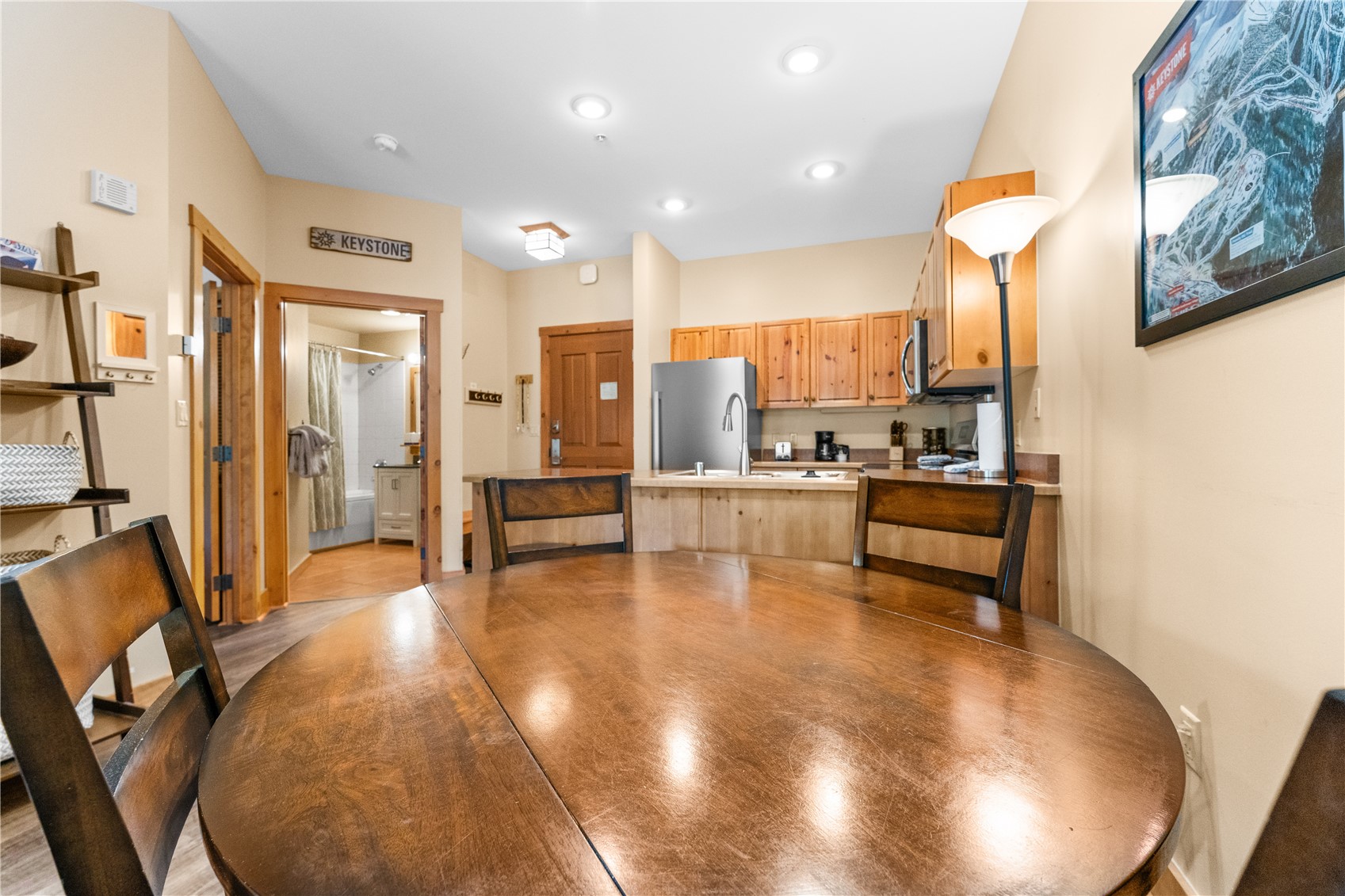 135 Dercum Drive, Unit 8563 Keystone, CO 80435 - Photo 9 of 35 a view of kitchen and dining area with chandelier
