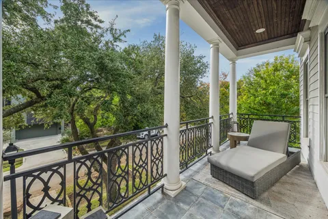 a view of a chair in the balcony