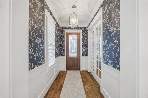 a view of entryway with chandelier