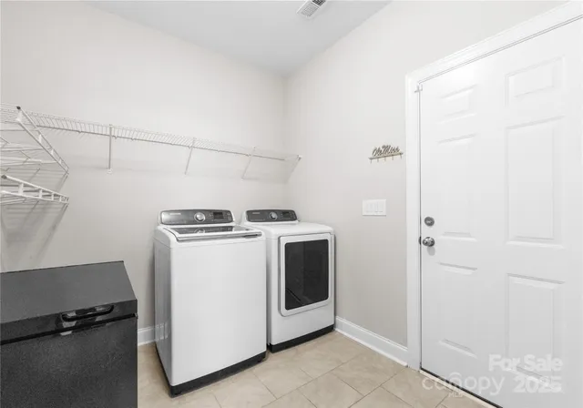 a view of a park with swings and slides