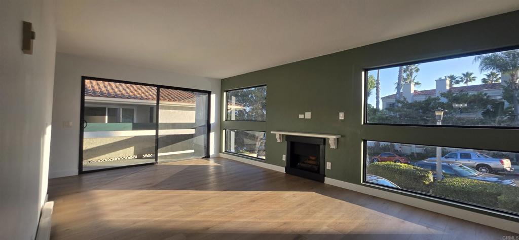 a view of a living room with entryway