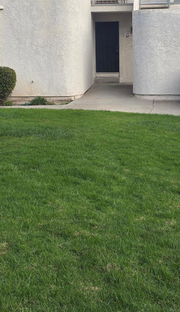2306 Altisma Way, Unit 116 Carlsbad, CA 92009 - Photo 15 of 17 a view of an outdoor space