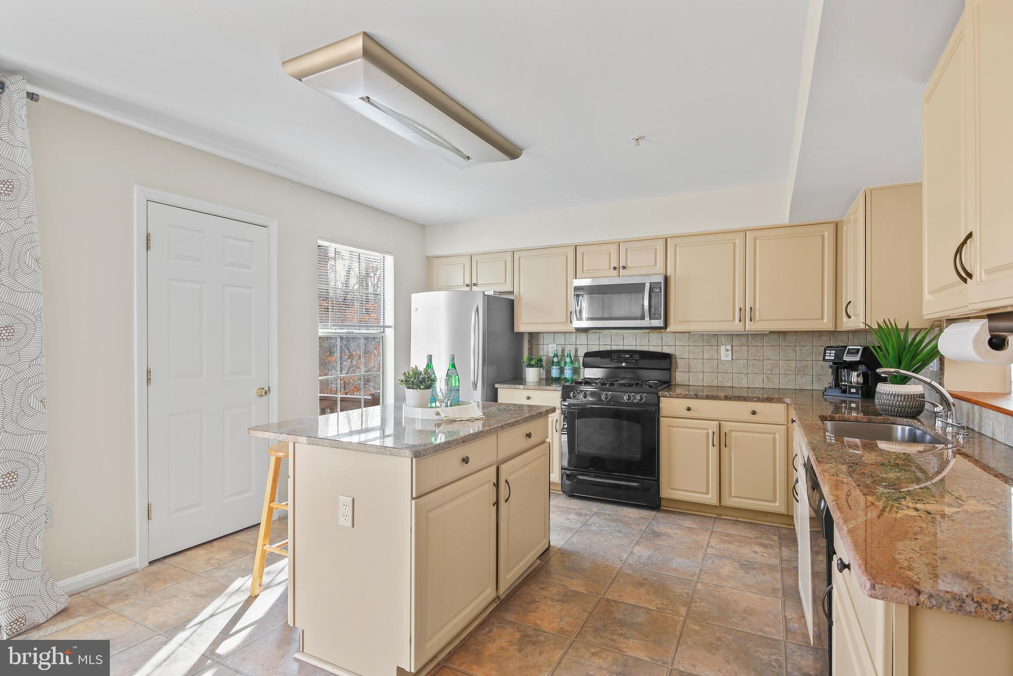 12227 Bare Bush Path Columbia, MD 21044 - Photo 13 of 35 Kitchen with Island