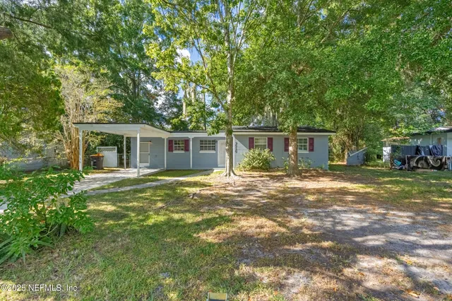 front view of a house with a patio