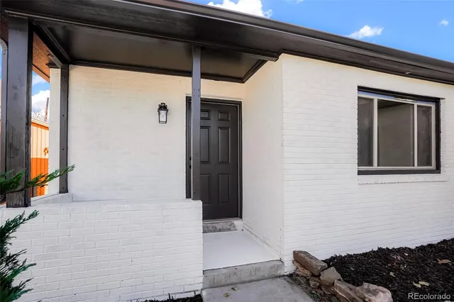 a front view of a house with a window