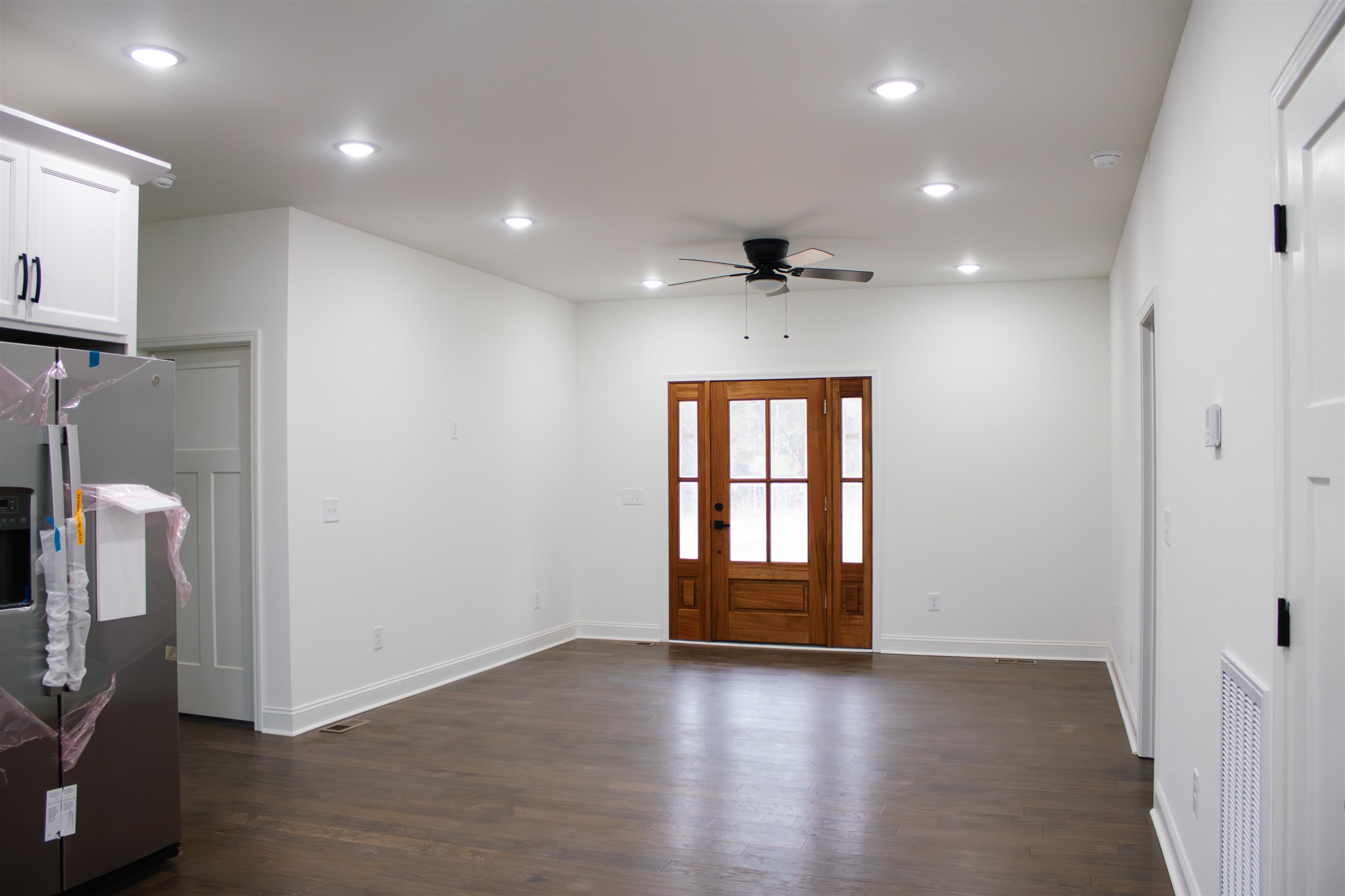 279 Oakgrove Road Selmer, TN 38375 - Photo 2 of 12 a view of livingroom and hardwood