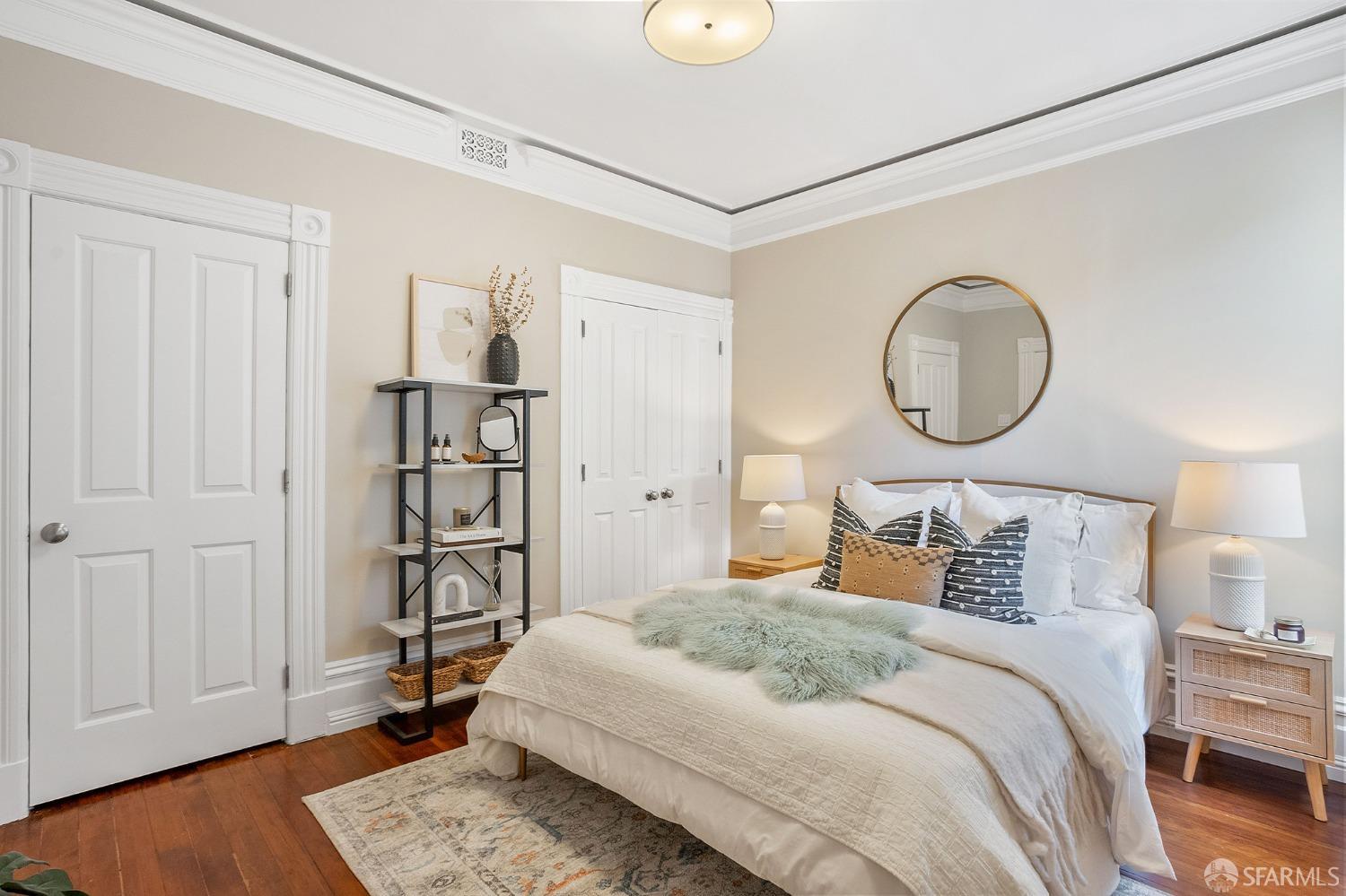 1772 Sanchez Street San Francisco, CA 94131 - Photo 13 of 23 a bedroom with a bed and a chandelier