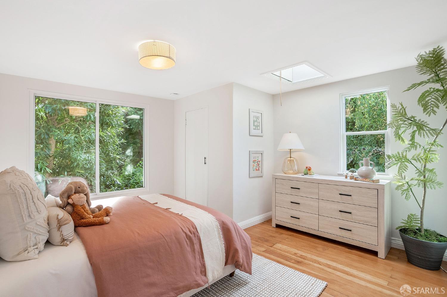 1772 Sanchez Street San Francisco, CA 94131 - Photo 18 of 23 a bedroom with a bed and a window