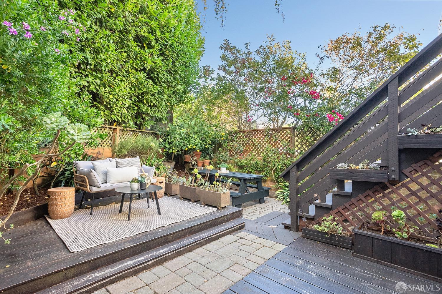 1772 Sanchez Street San Francisco, CA 94131 - Photo 20 of 23 a view of a patio with couches table and chairs and potted plants