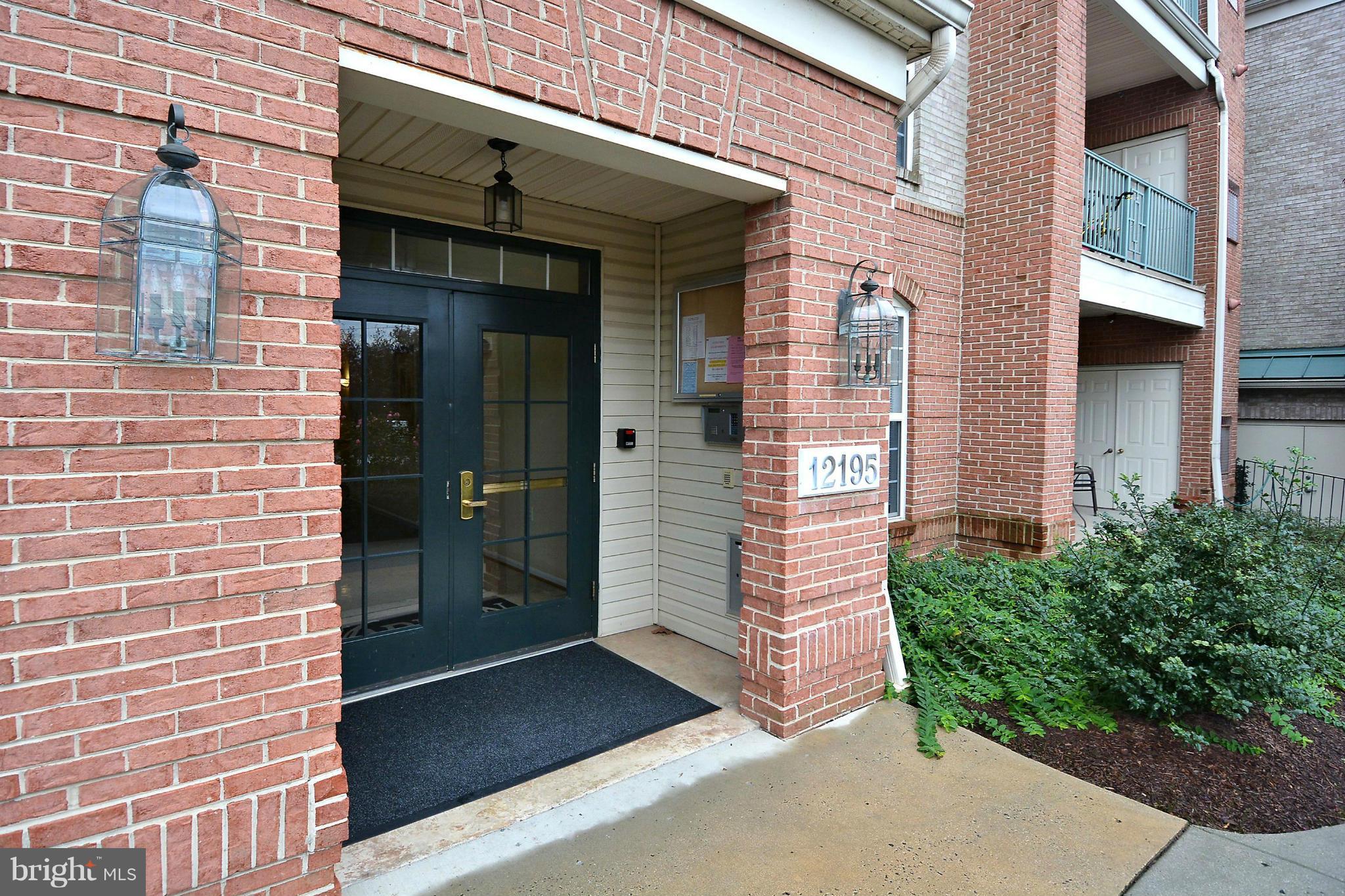 12195 Abington Hall Place, Unit 102 Reston, VA 20190 - Photo 2 of 30 Exterior (Front)