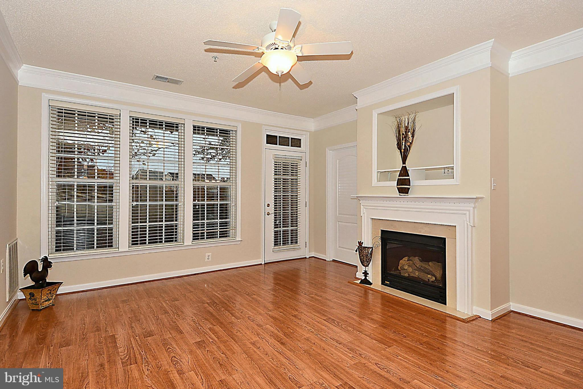 12195 Abington Hall Place, Unit 102 Reston, VA 20190 - Photo 4 of 30 Living Room