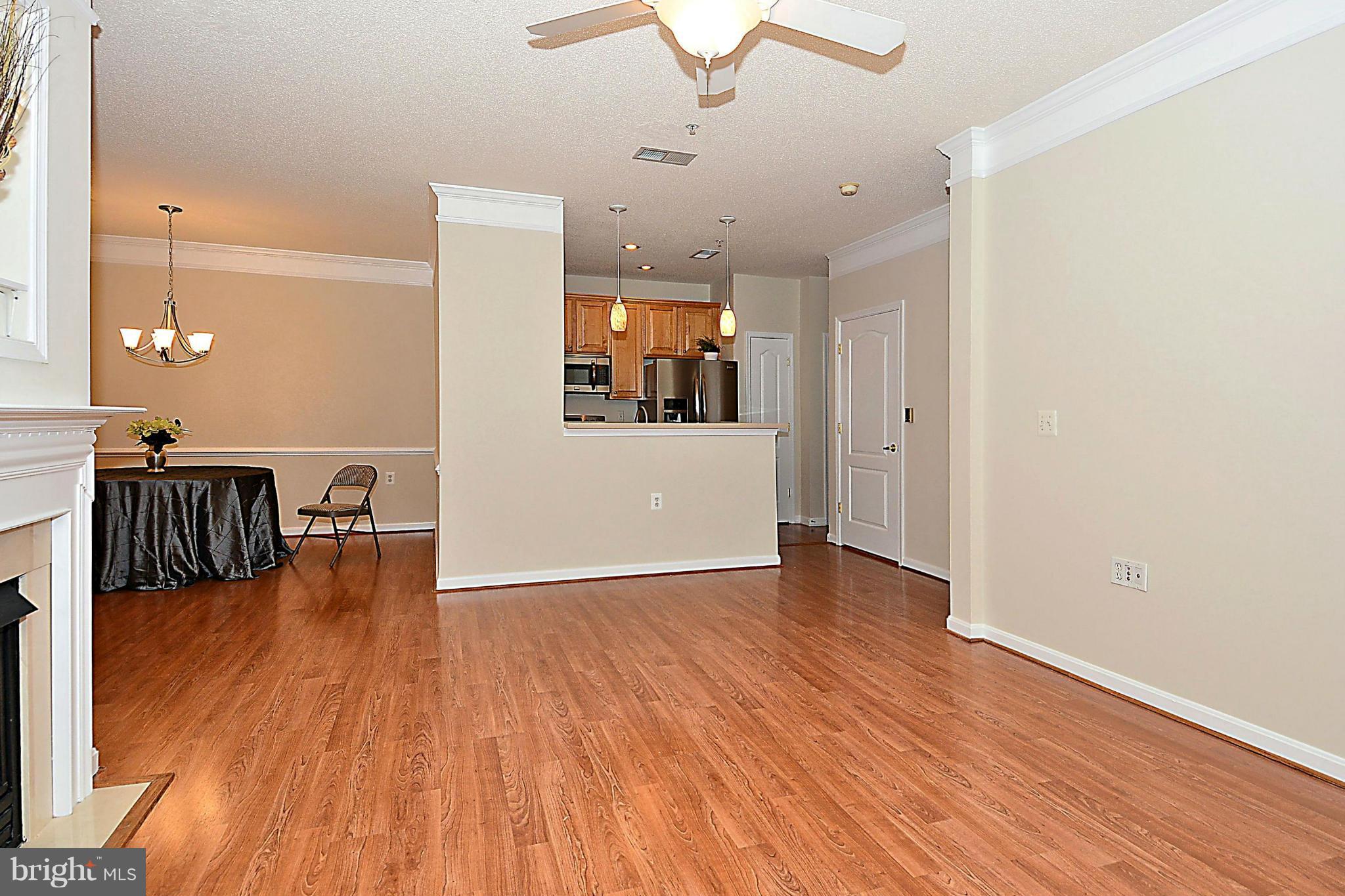 12195 Abington Hall Place, Unit 102 Reston, VA 20190 - Photo 6 of 30 Living Room