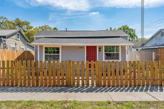 a view of a backyard of the house