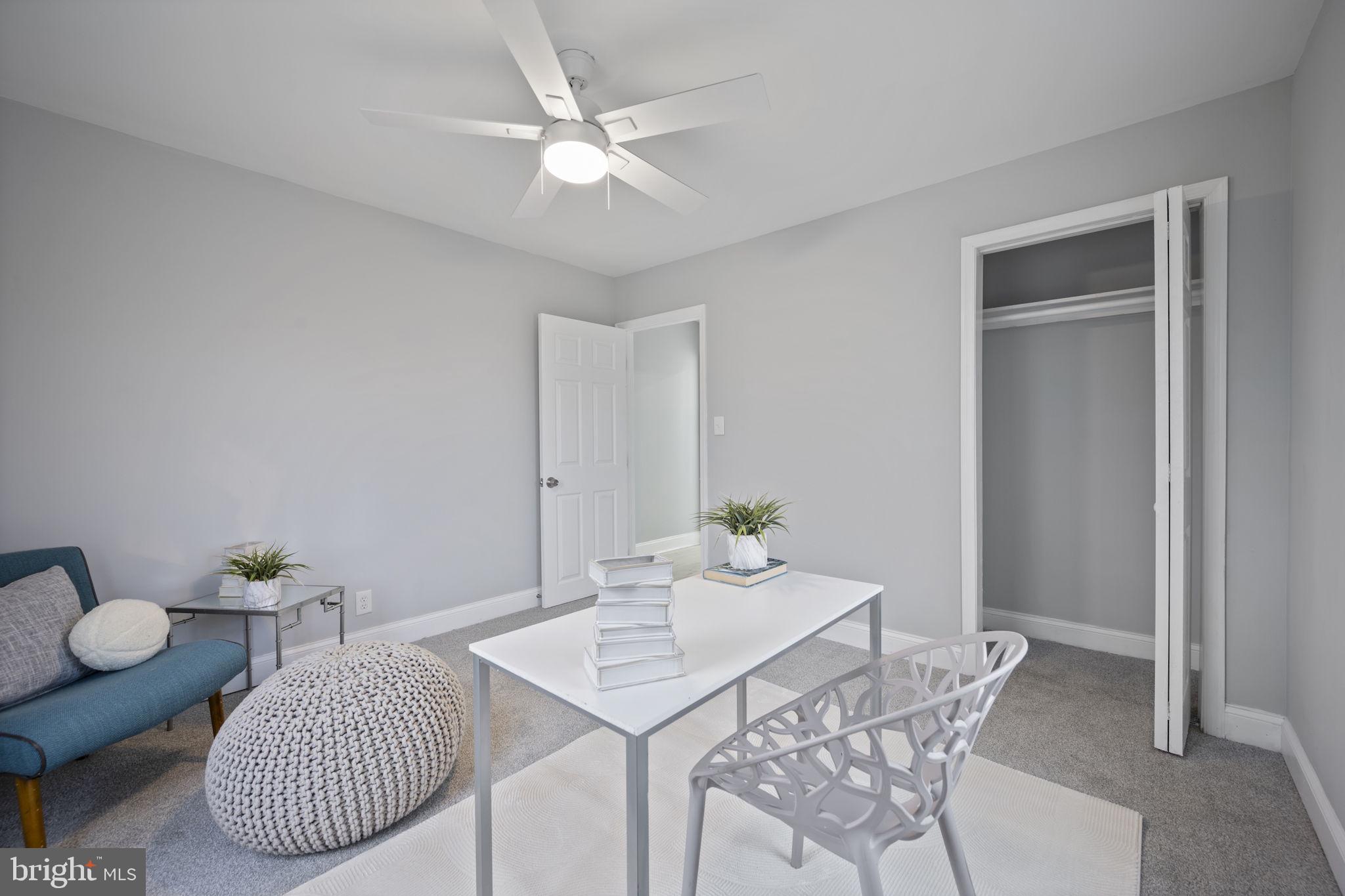 511 Riverside Drive Baltimore, MD 21221 - Photo 11 of 39 a view of a dining room with furniture and wooden floor