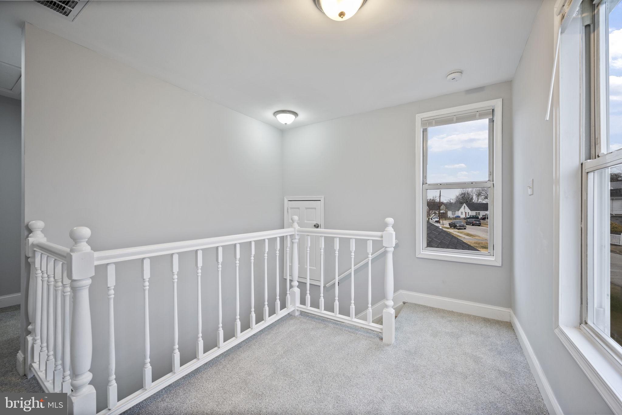 511 Riverside Drive Baltimore, MD 21221 - Photo 19 of 39 a view of an empty room with a window