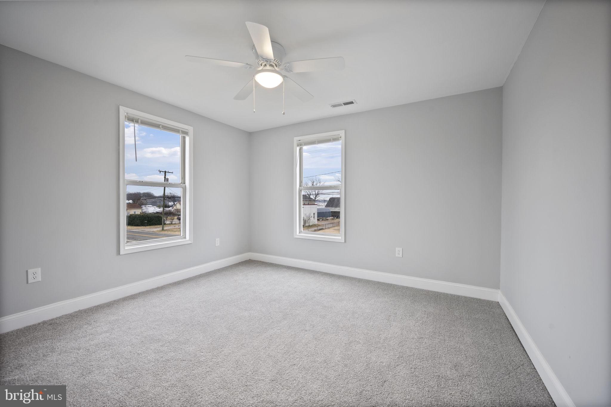 511 Riverside Drive Baltimore, MD 21221 - Photo 23 of 39 an empty room with a window