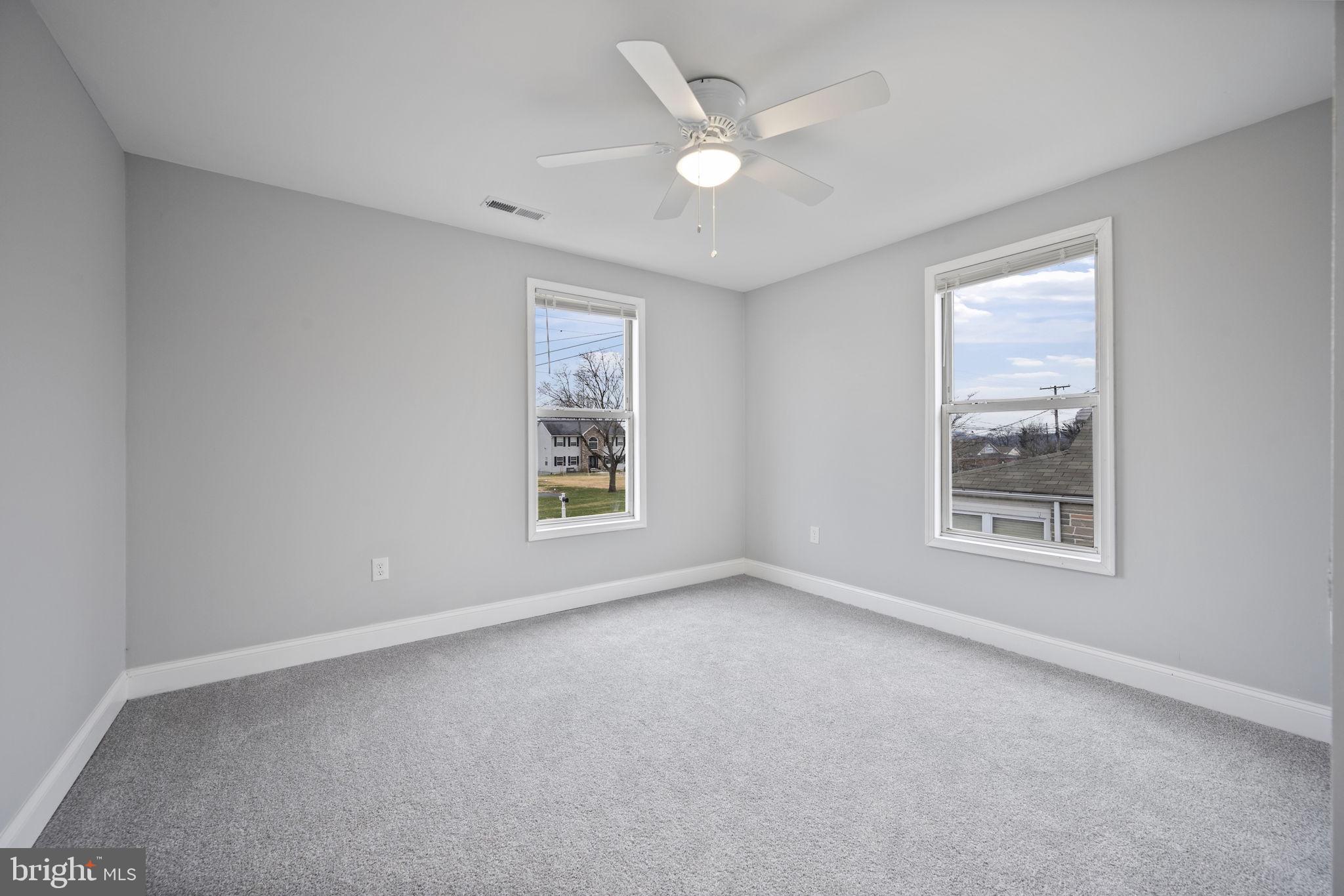 511 Riverside Drive Baltimore, MD 21221 - Photo 27 of 39 an empty room with a window