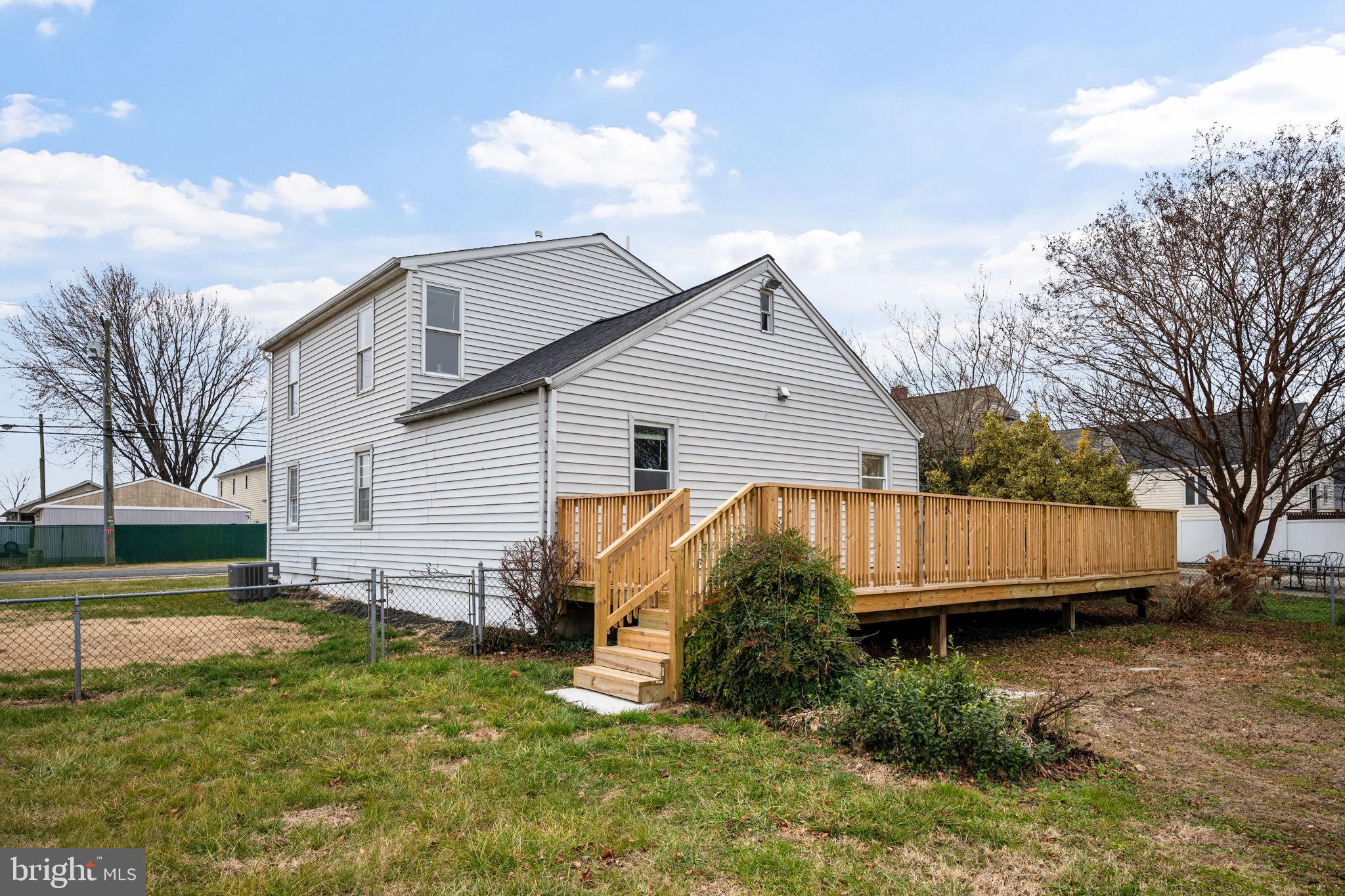 511 Riverside Drive Baltimore, MD 21221 - Photo 30 of 39 a view of a house with a yard