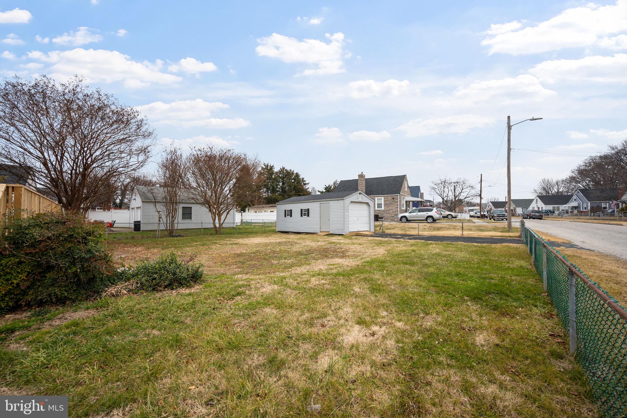 511 Riverside Drive Baltimore, MD 21221 - Photo 31 of 39 a view of yard with swimming pool and lake view