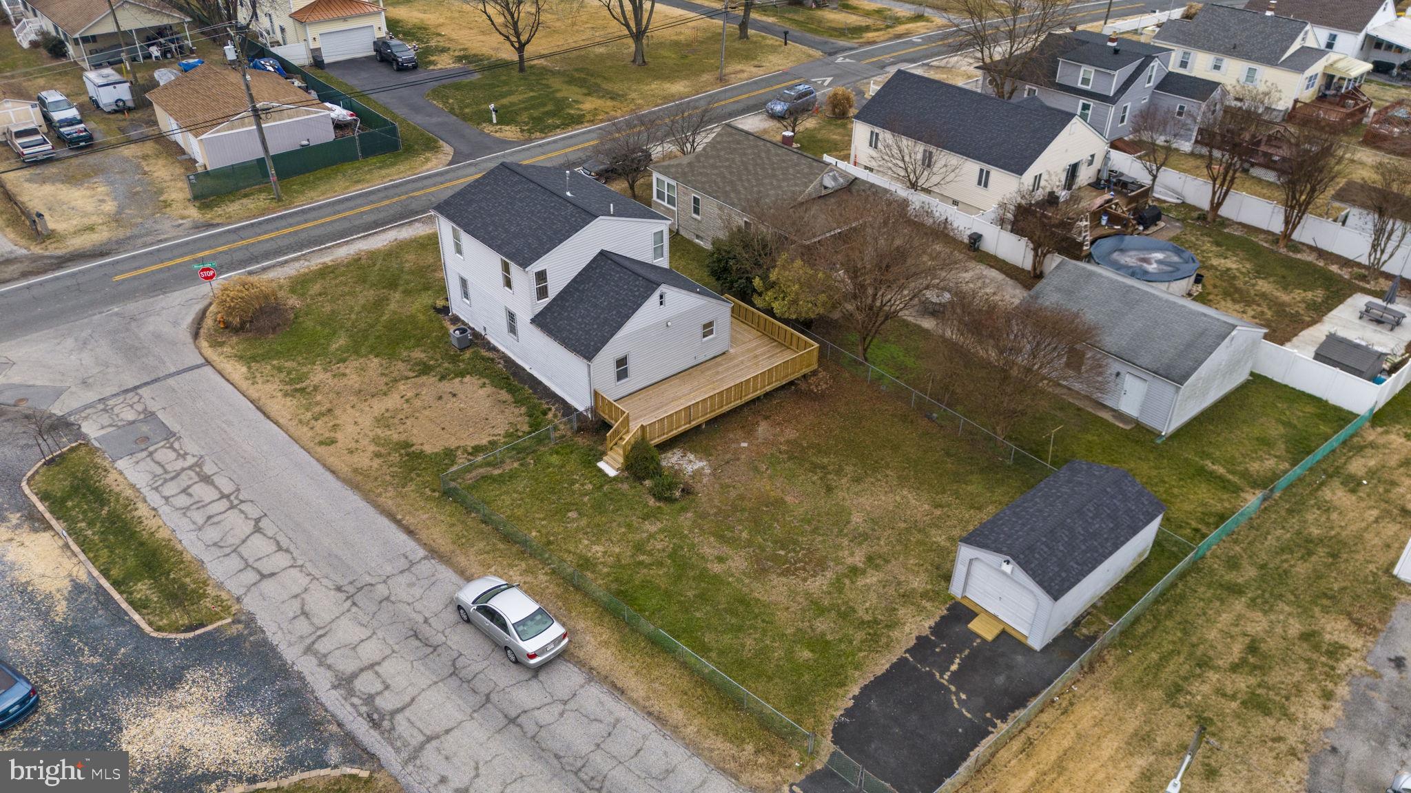 511 Riverside Drive Baltimore, MD 21221 - Photo 35 of 39 an aerial view of a house with a yard
