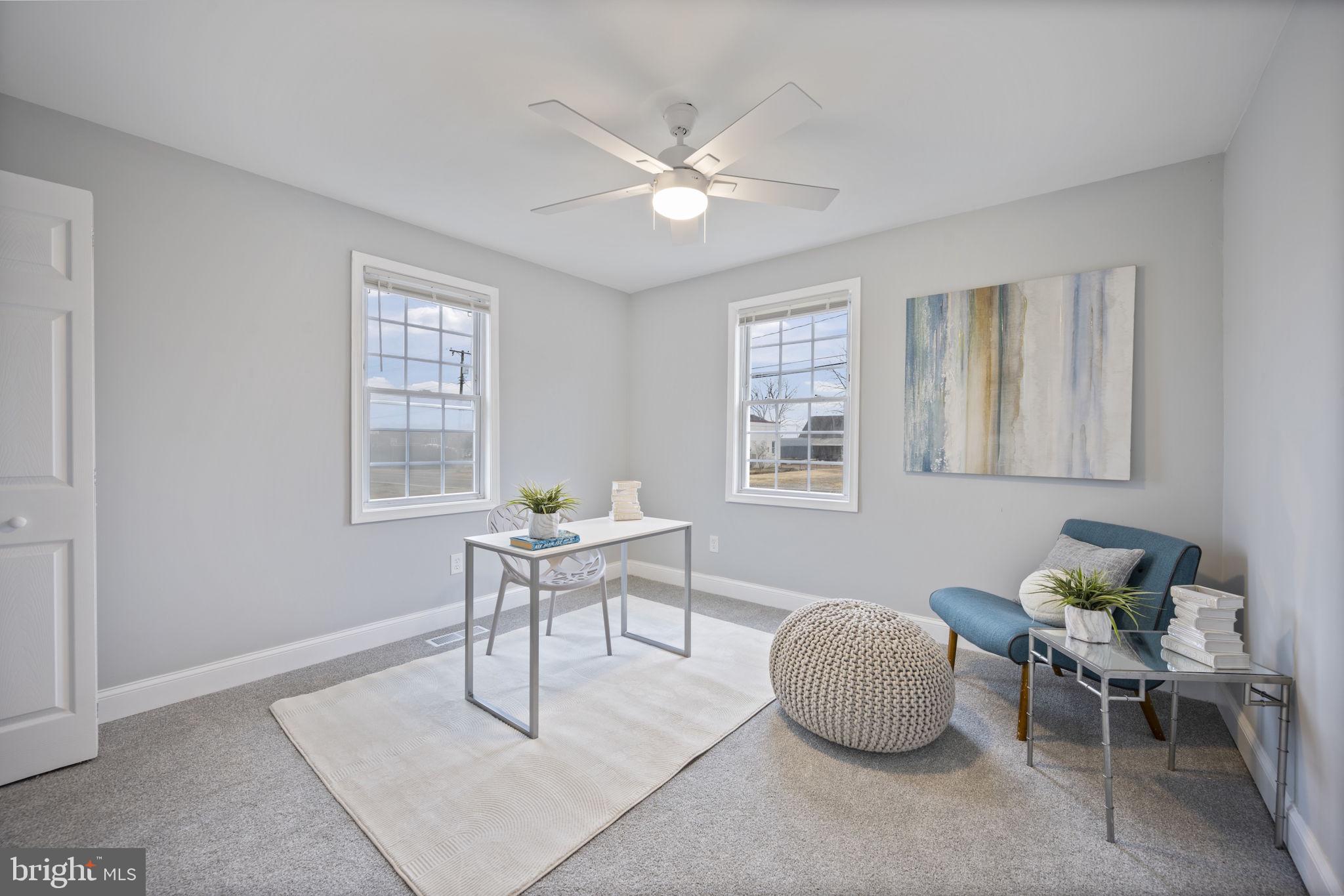 511 Riverside Drive Baltimore, MD 21221 - Photo 10 of 39 a living room with furniture and windows