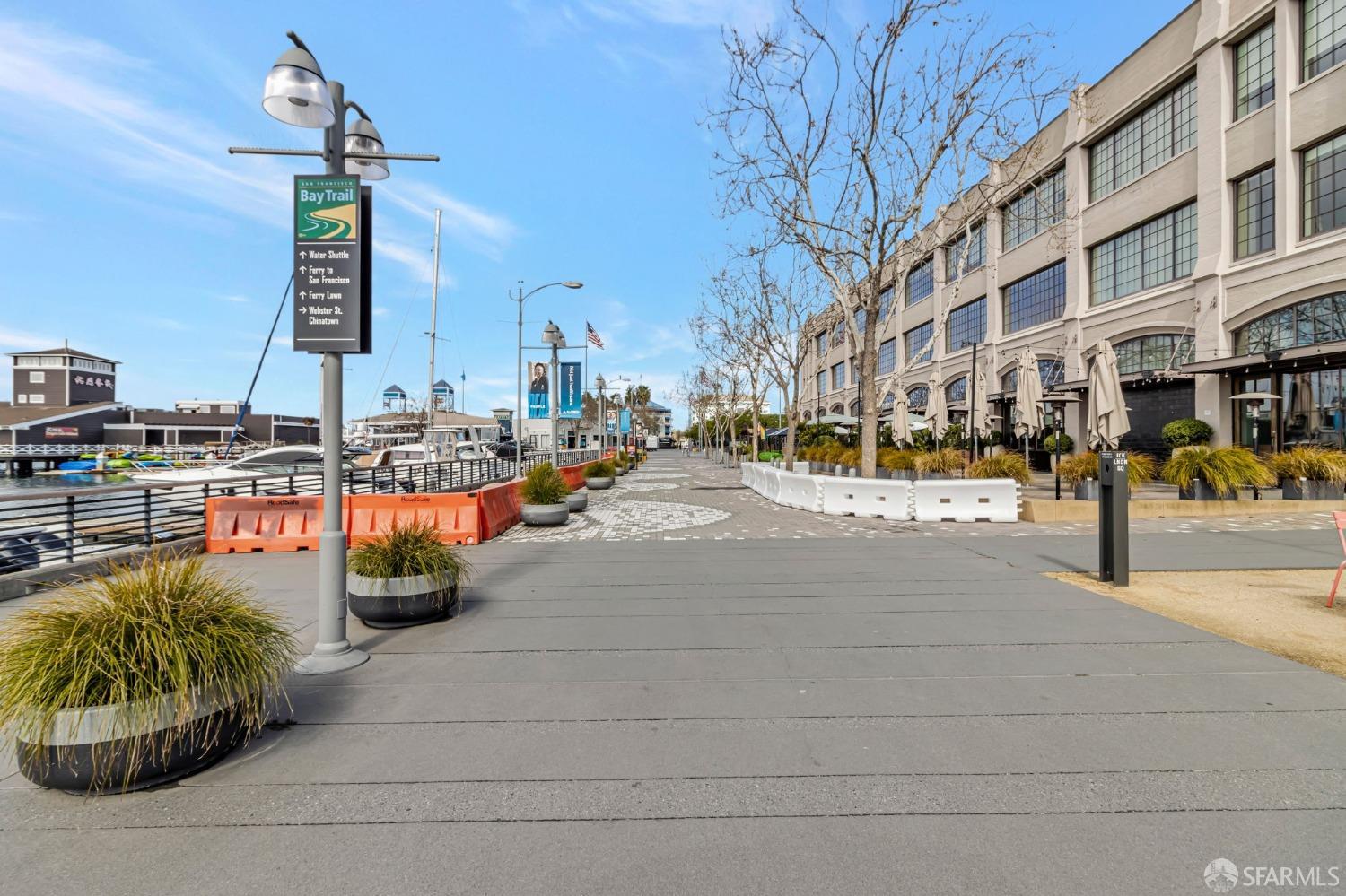 200 2nd Street, Unit 408 Oakland, CA 94607 - Photo 24 of 29 a city street lined with tall buildings
