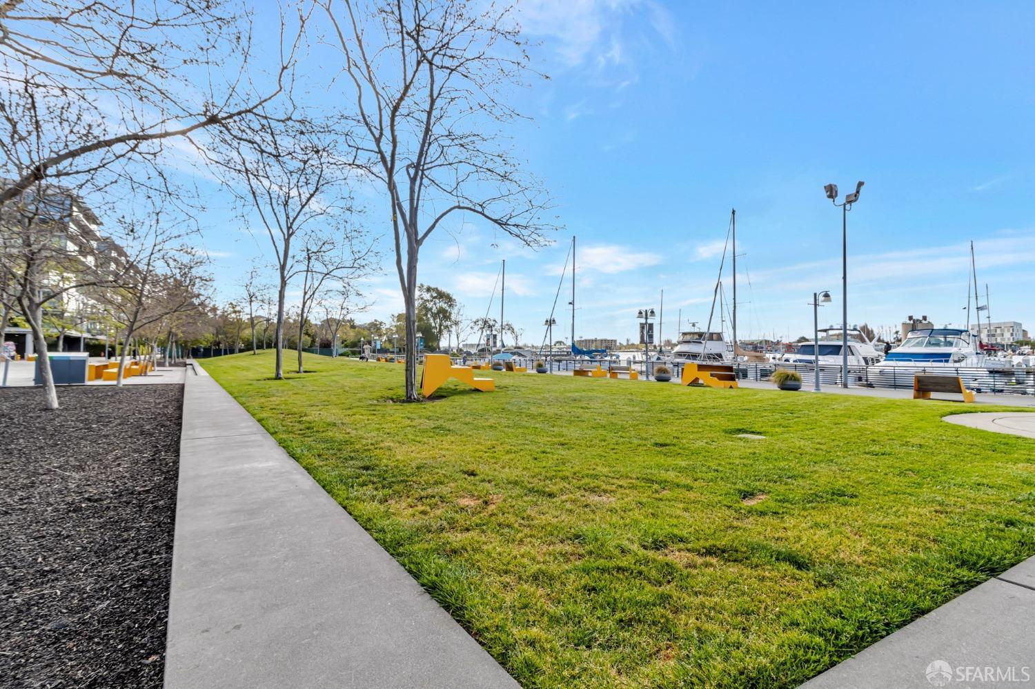200 2nd Street, Unit 408 Oakland, CA 94607 - Photo 28 of 29 a view of yard with swimming pool and green space