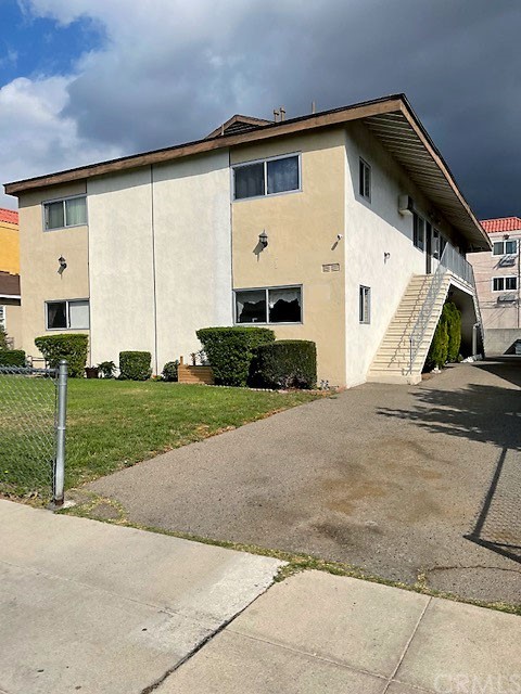2250 North Frederic Street Burbank, CA 91504 - Photo 1 of 1 a front view of a house with a yard