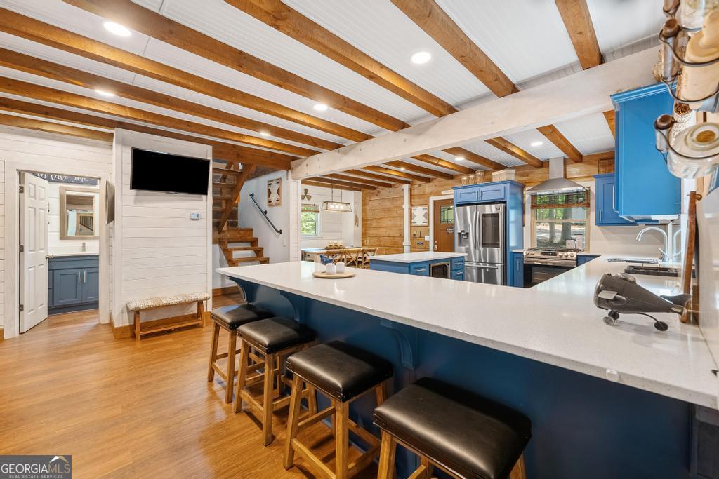 585 John Fleming Road Hartwell, GA 30643 - Photo 11 of 59 a room with furniture and a view of kitchen