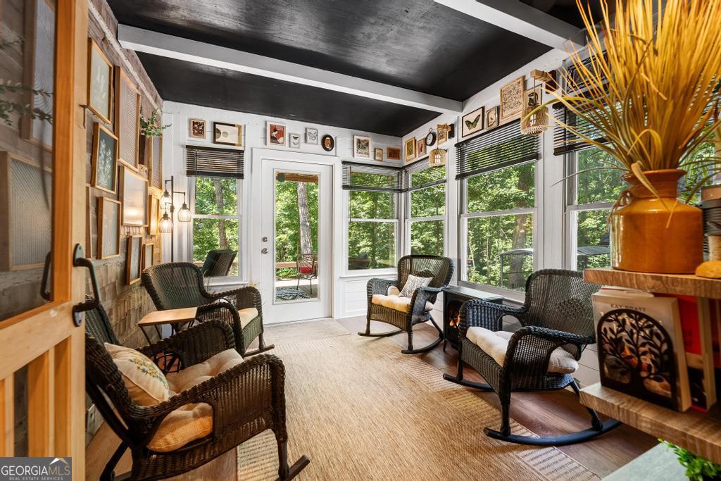 585 John Fleming Road Hartwell, GA 30643 - Photo 18 of 59 a living room with furniture and a large window