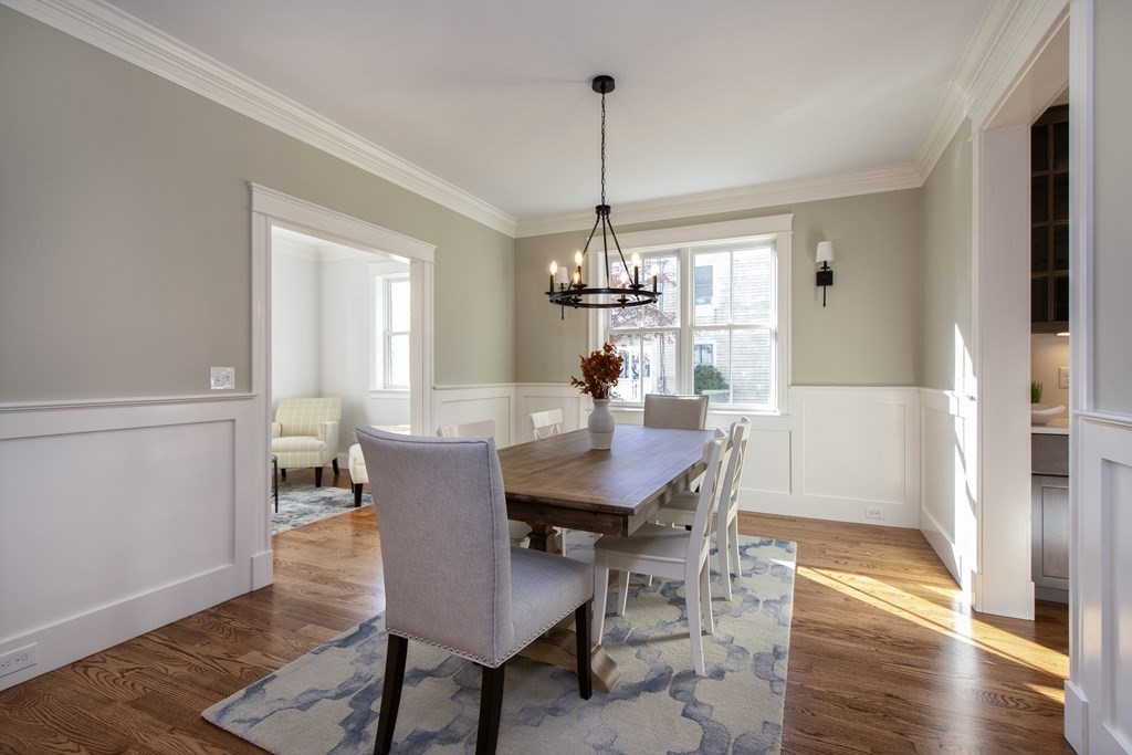 72 Douglas Road Needham, MA 02492 - Photo 16 of 31 a view of a dining room with furniture window and wooden floor