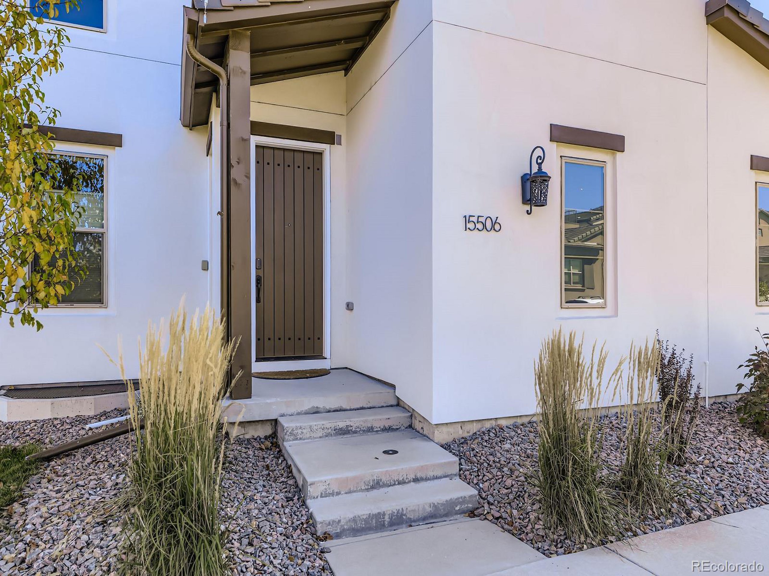 15506 W Lane Lakewood, CO 80228 - Photo 2 of 37 a view of a front door of the house