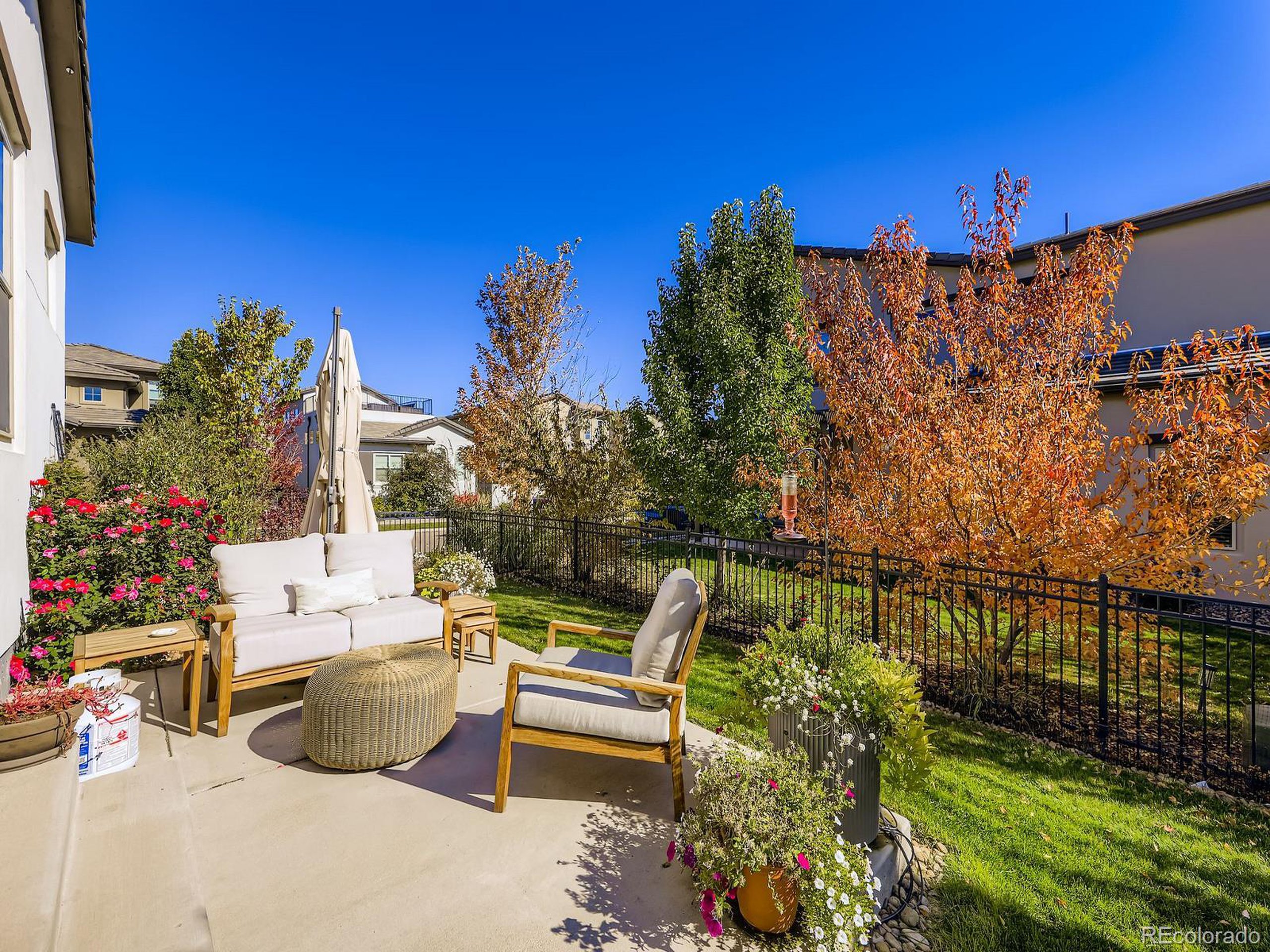 15506 W Lane Lakewood, CO 80228 - Photo 30 of 37 a view of a terrace with couches and potted plants